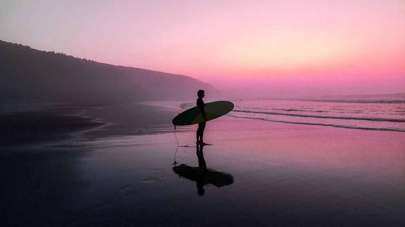 surfing at sunrise 1296x728 header