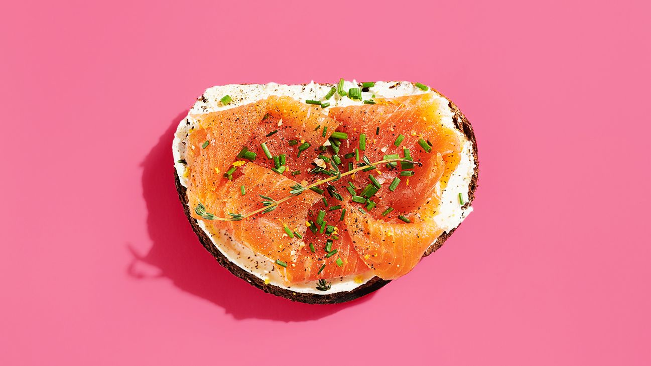 salmon on pink background header