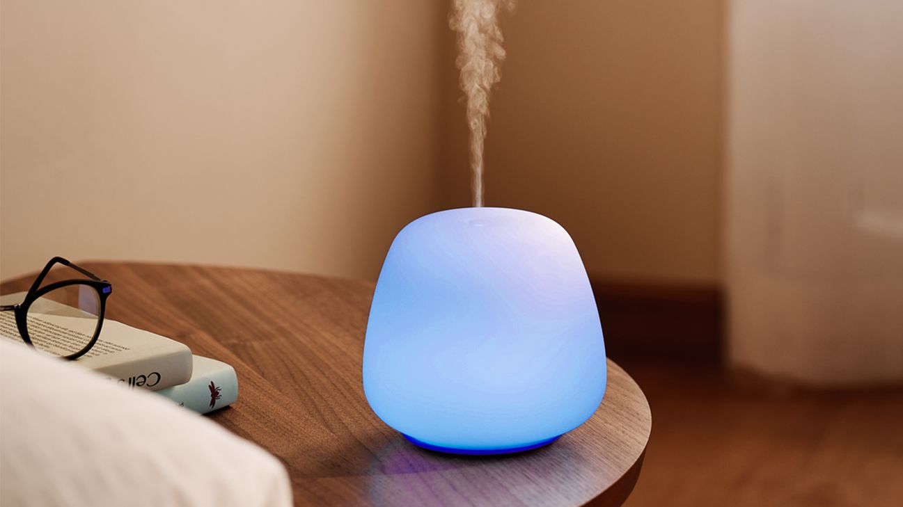 essential oil diffuser on wood table