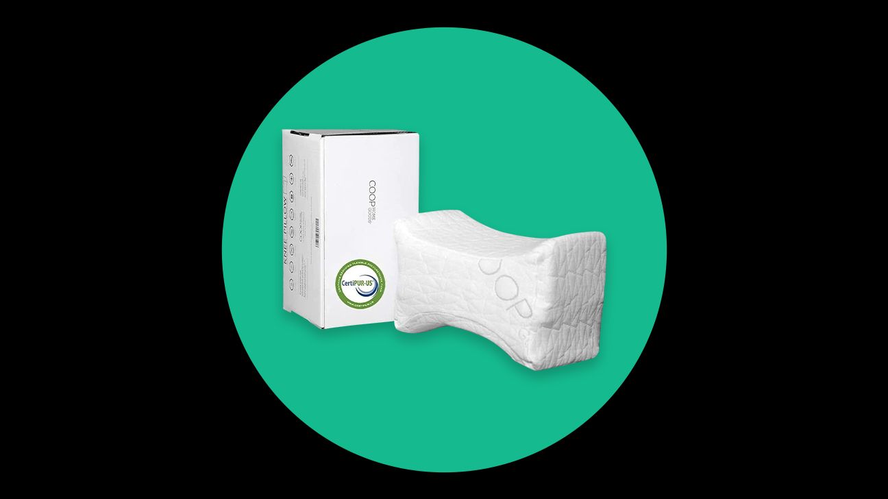 https://media.post.rvohealth.io/wp-content/uploads/sites/2/2021/10/412162-Coop-Home-Goods-Leg-Support-Knee-Pillow-Adjustable-Orthopedic-Memory-Foam.png
