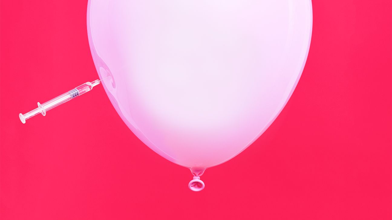 botox needle piercing a pink balloon