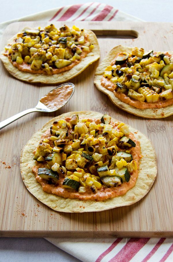  Grilled zucchini and corn tostadas with spicy hummus
