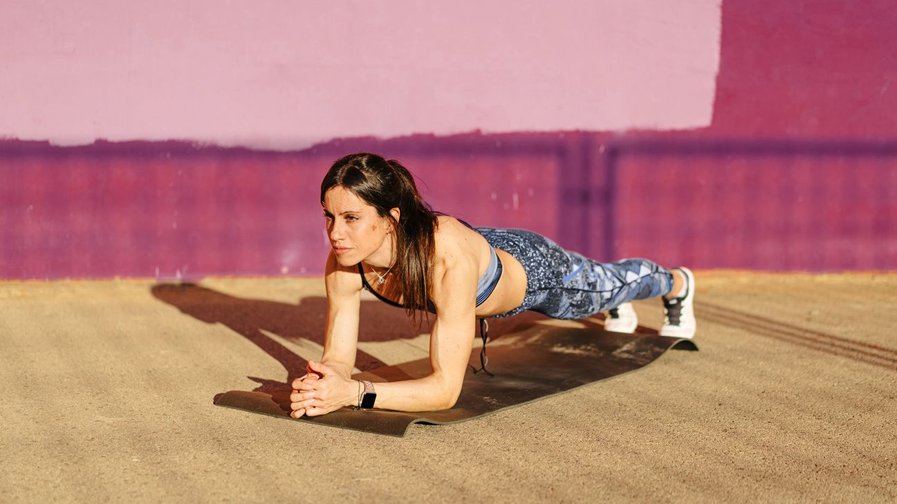 person doing a time under tension plank