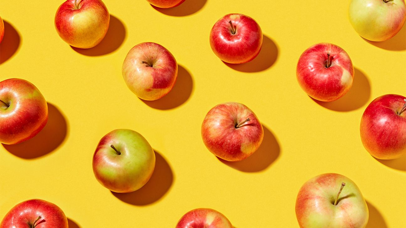 Apples on a yellow background