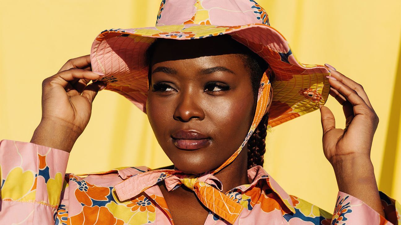 person wearing a sunhat in the sunshine