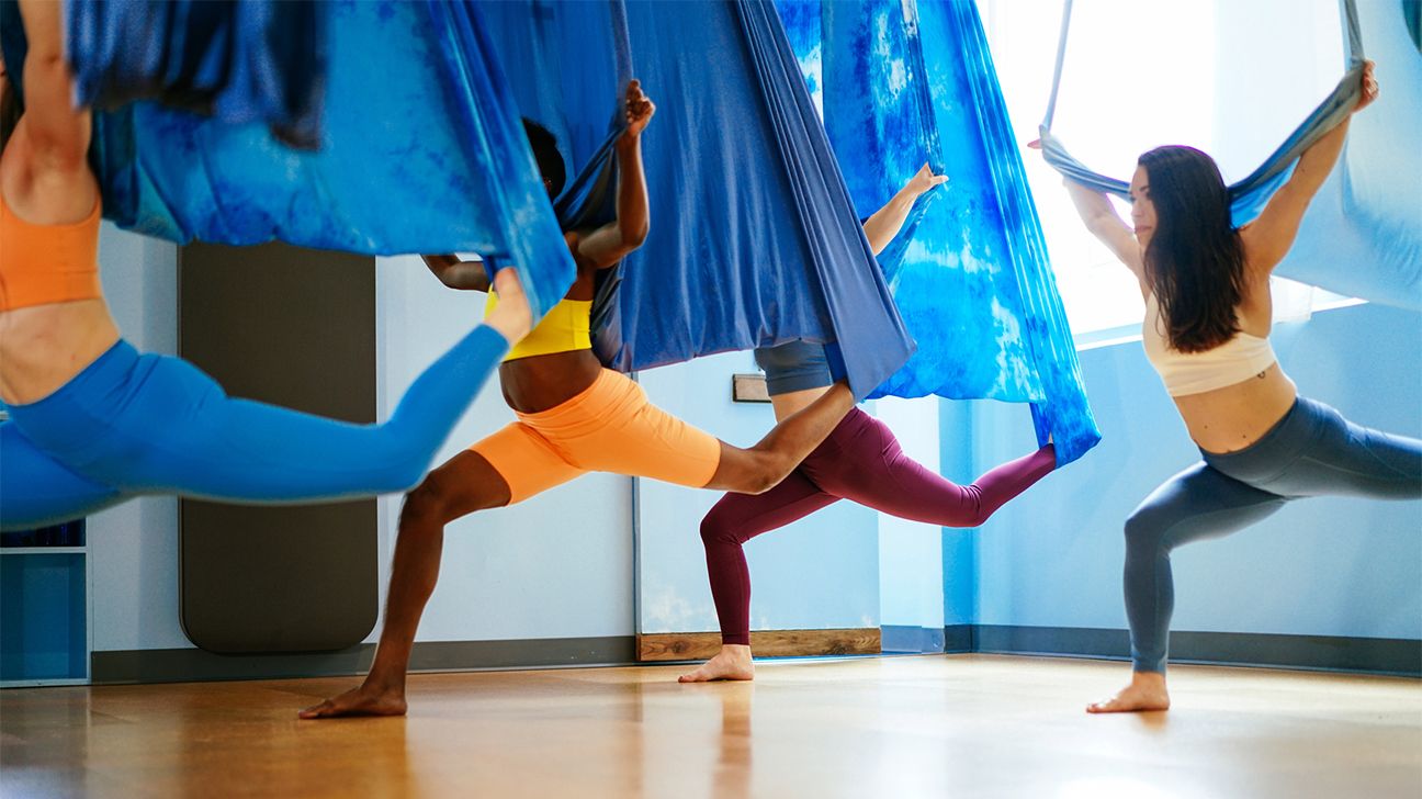 Young Woman Doing Aerial Yoga in Green Hammock. Stock Image - Image of  people, instructor: 108542923