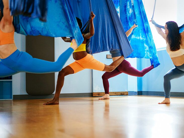 Aerial Yoga: What is it, best exercises, and how to practise it for maximum  benefits