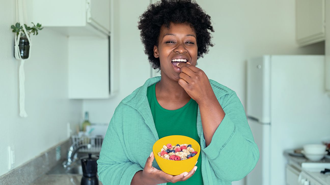 woman eating pre-workout snacks