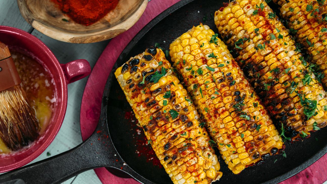 Grilled corn on the cob in skillet