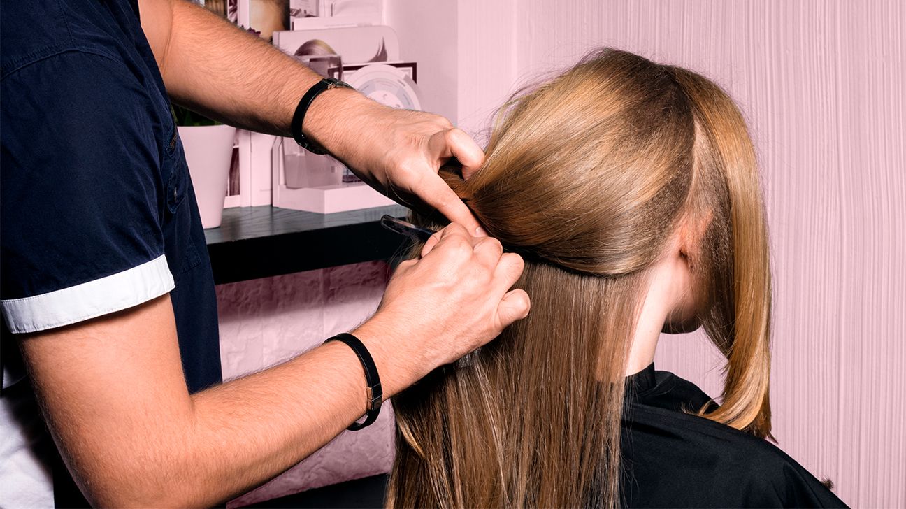 oily hair person getting their hair done