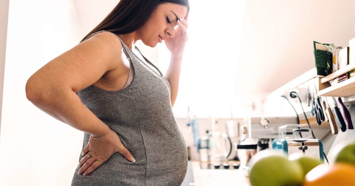 Why do women suffer from UTIs post pregnancy?
