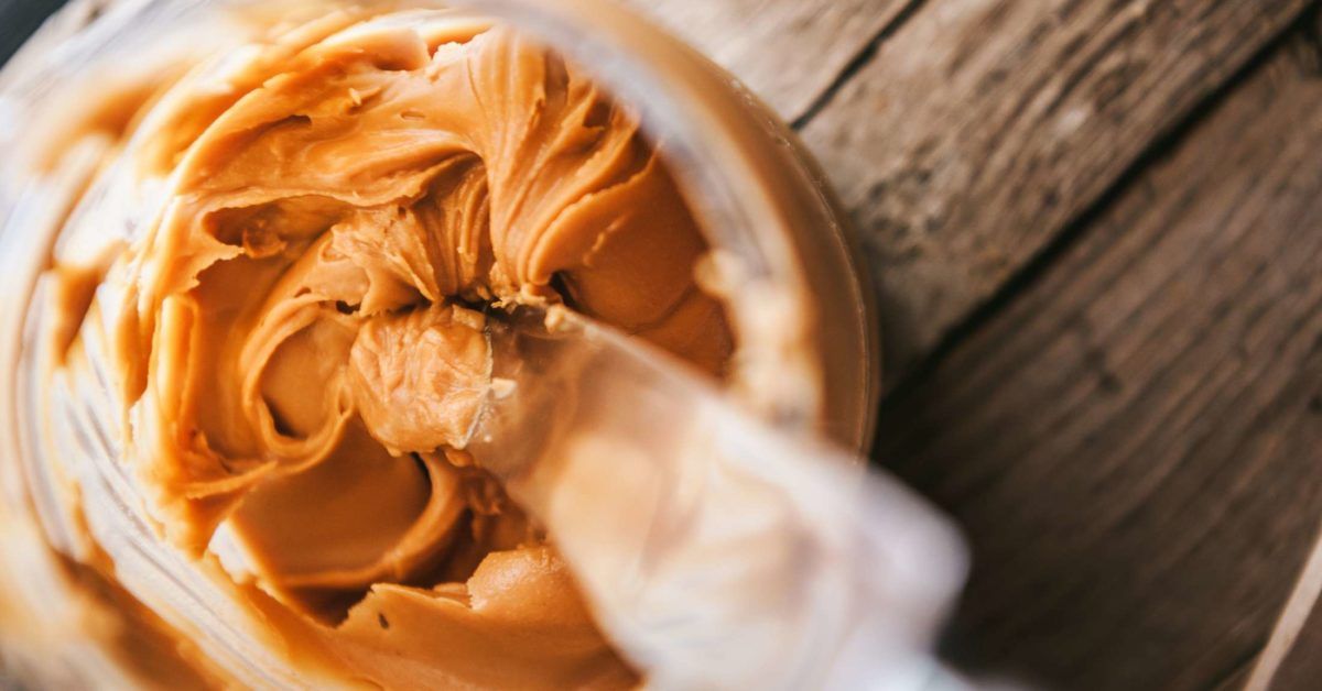The Real Reason Peanut Butter Is So Cheap