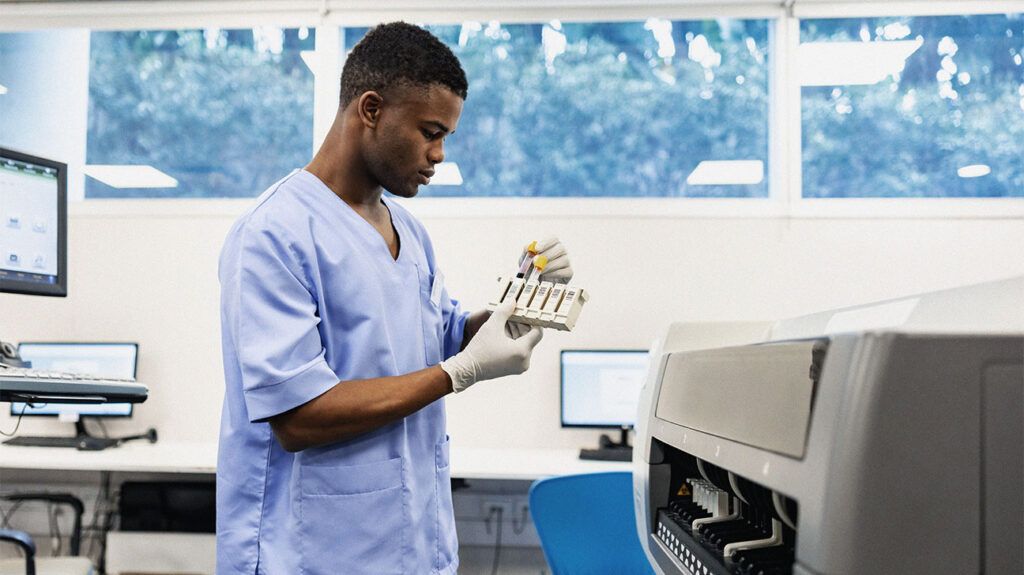 A healthcare professional looking at blood tests to help diagnose colon cancer -2.