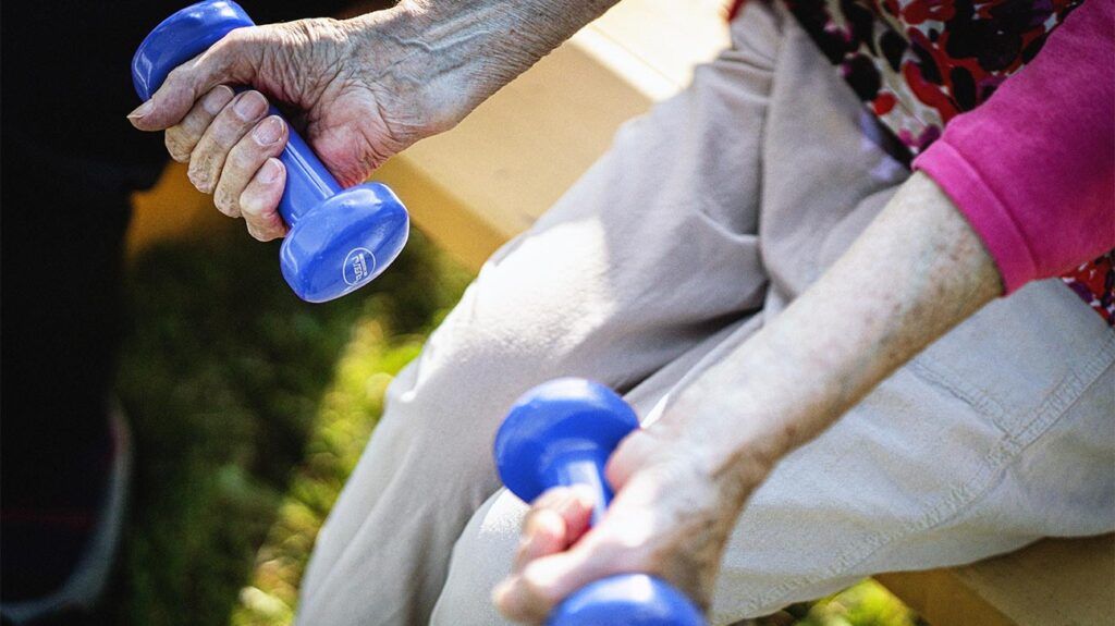 A person with osteoporosis exercising. -1