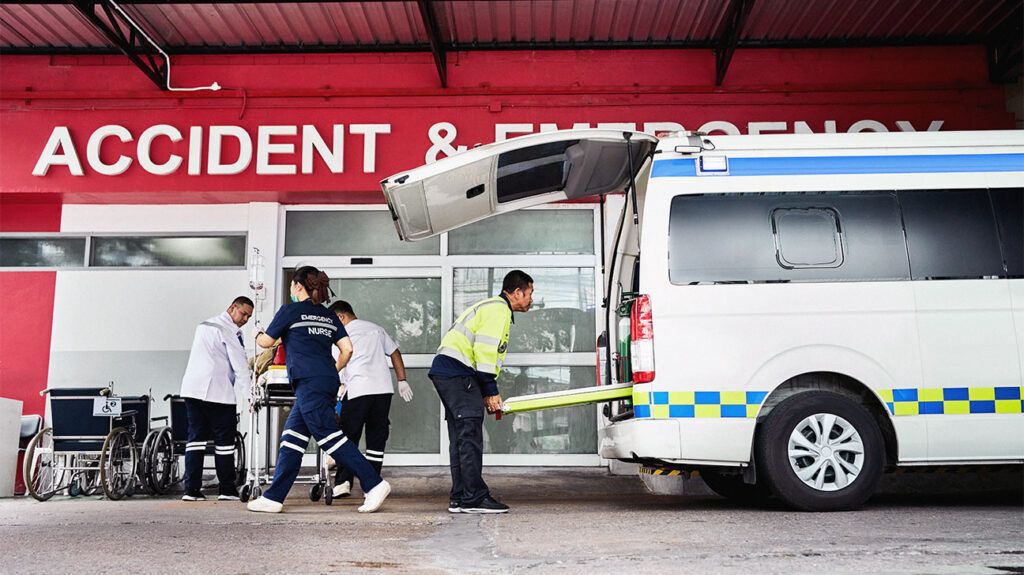 Paramedics transferring a person to hospital-2.