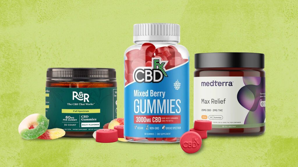 A selection of different types of CBD: gummies, salves, and drops, against a green background.