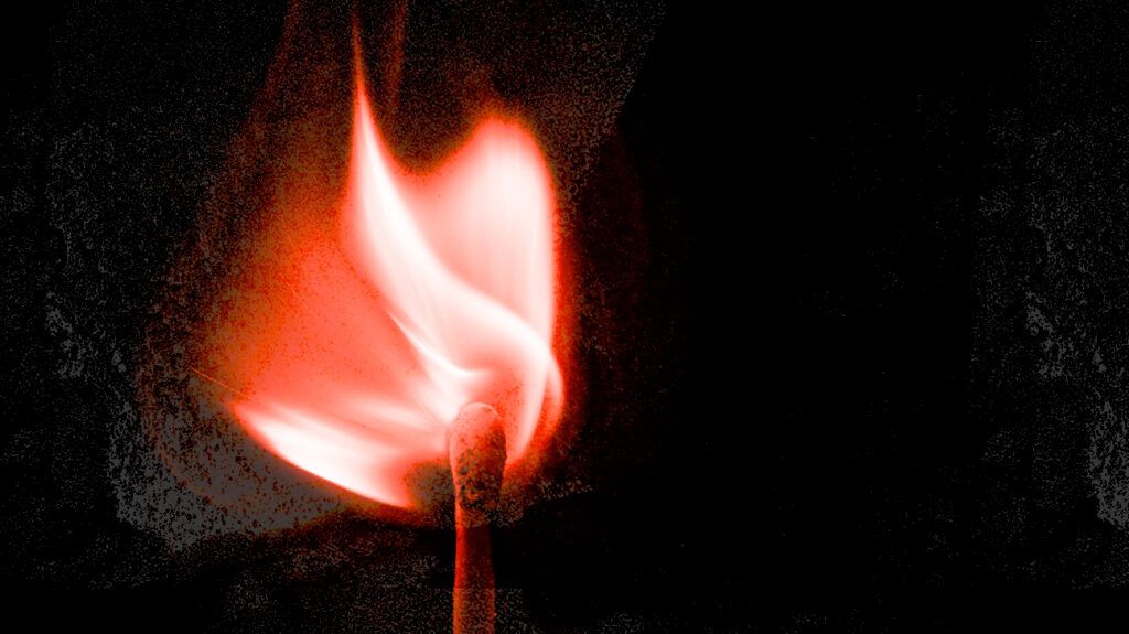 A burning match against a black background to represent a burning sensation -2.