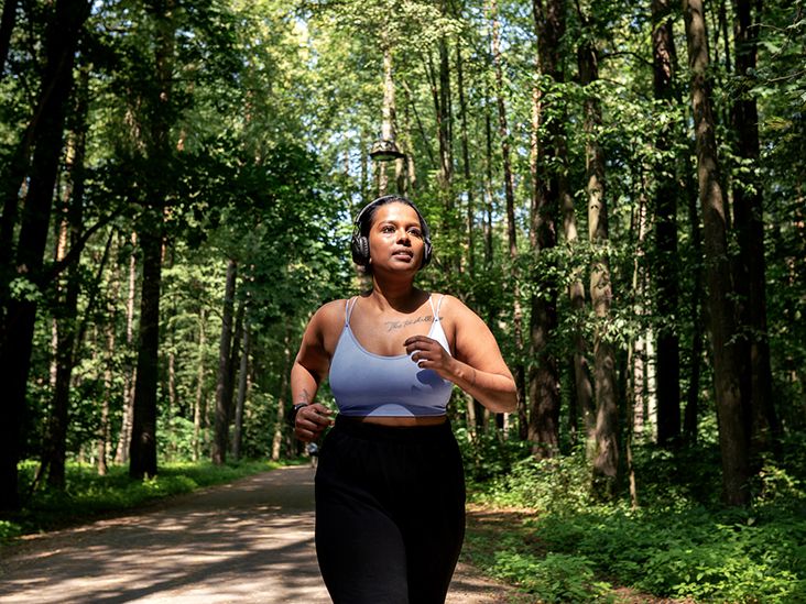 A woman running in the forest