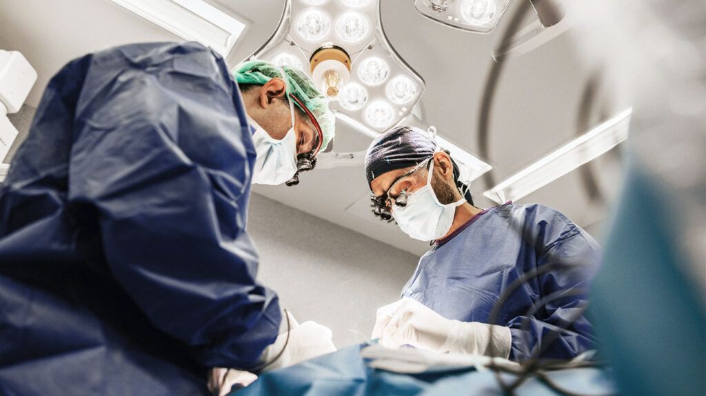 Surgeons in an operating theater-1.