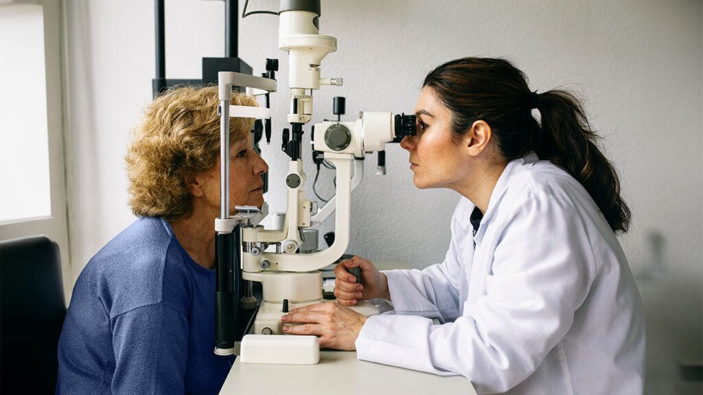 A doctor performing an eye examination. -2