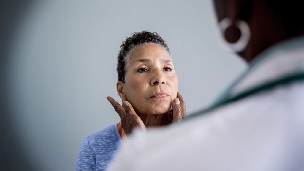 a patient is being examined by a doctor