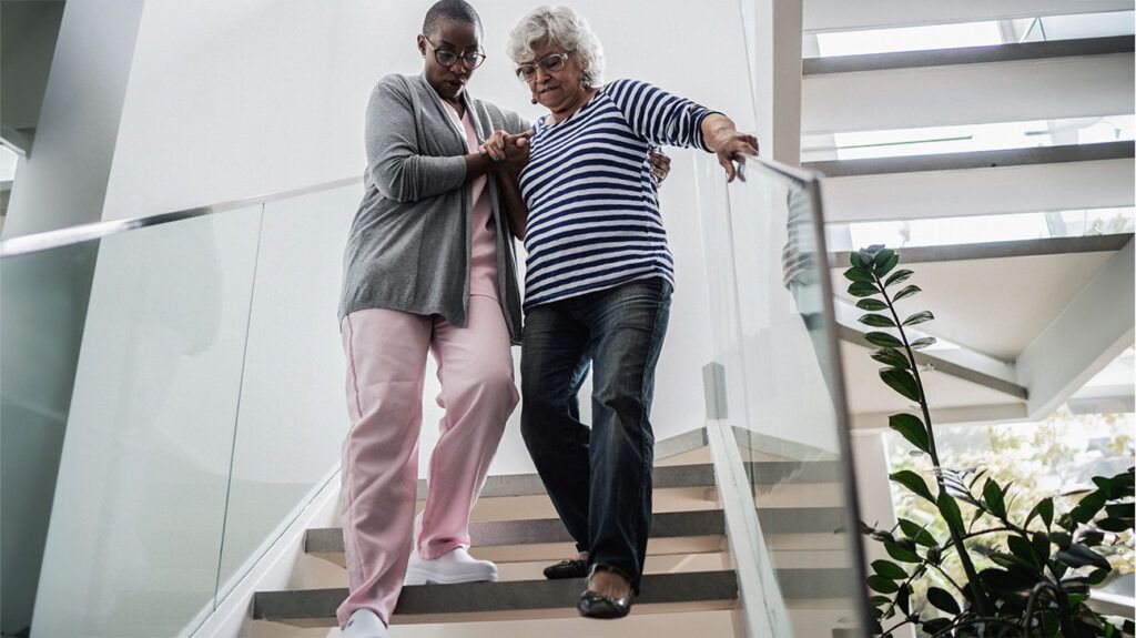 two people walking downstairs