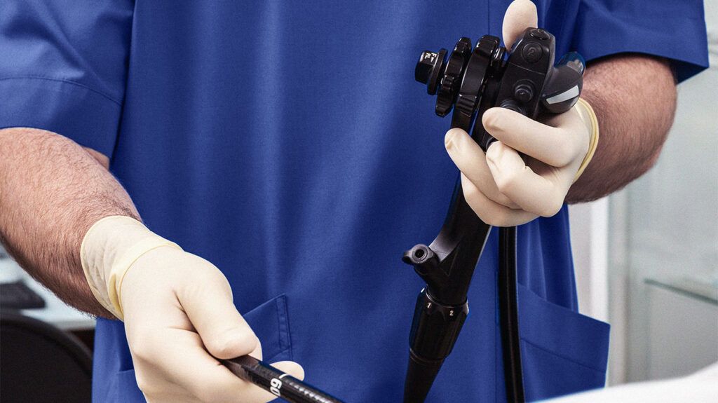 A doctor holding an endoscope -2.