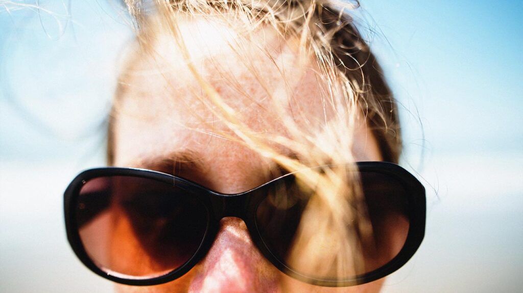 Close up of a female wearing sunglasses
