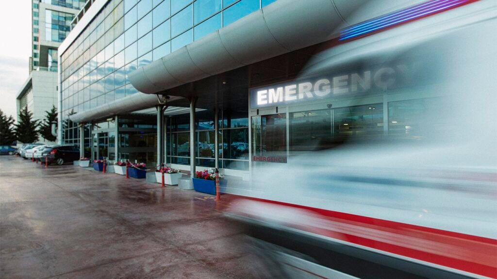 Blurred image of the front of an emergency room