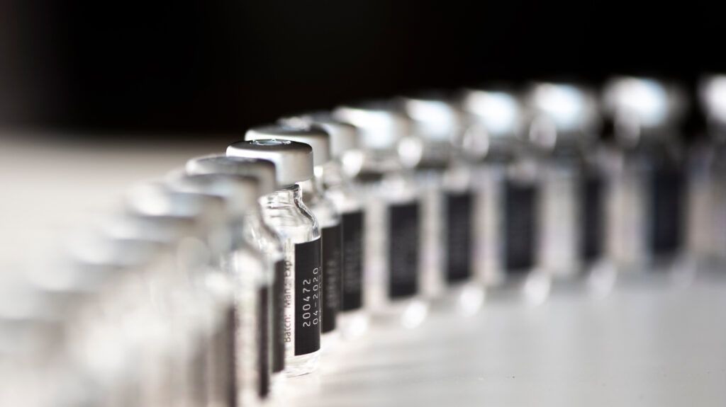 A row of vaccine vials