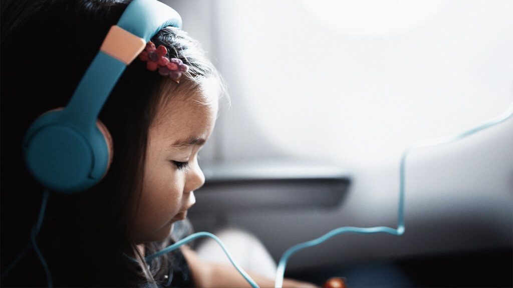 Young child wearing headphones-1