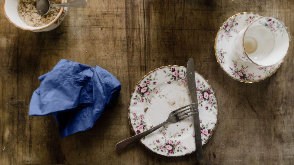 Empty plates on a wooden table