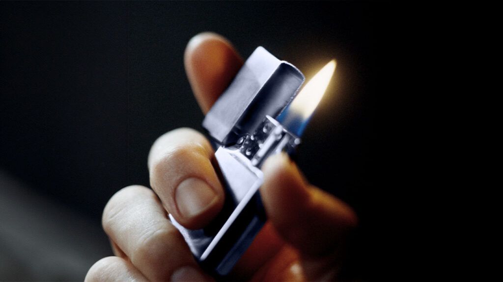 Close up of a lighter in hand