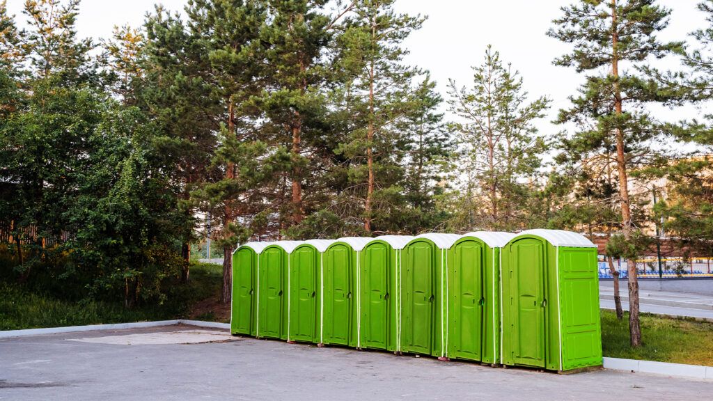 Row of green toilets