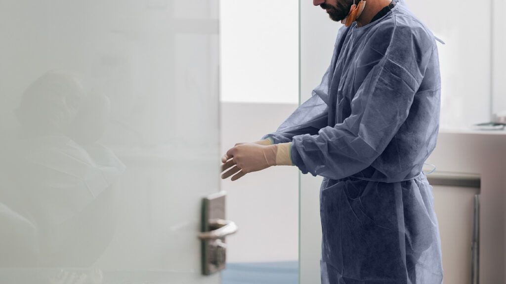 A surgeon washing his hands preparing to perform a supratentorial craniotomy -1.
