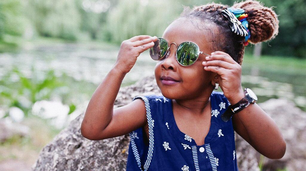 Young child wearing sunglasses