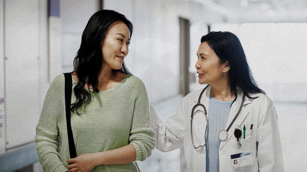Female speaking with a doctor
