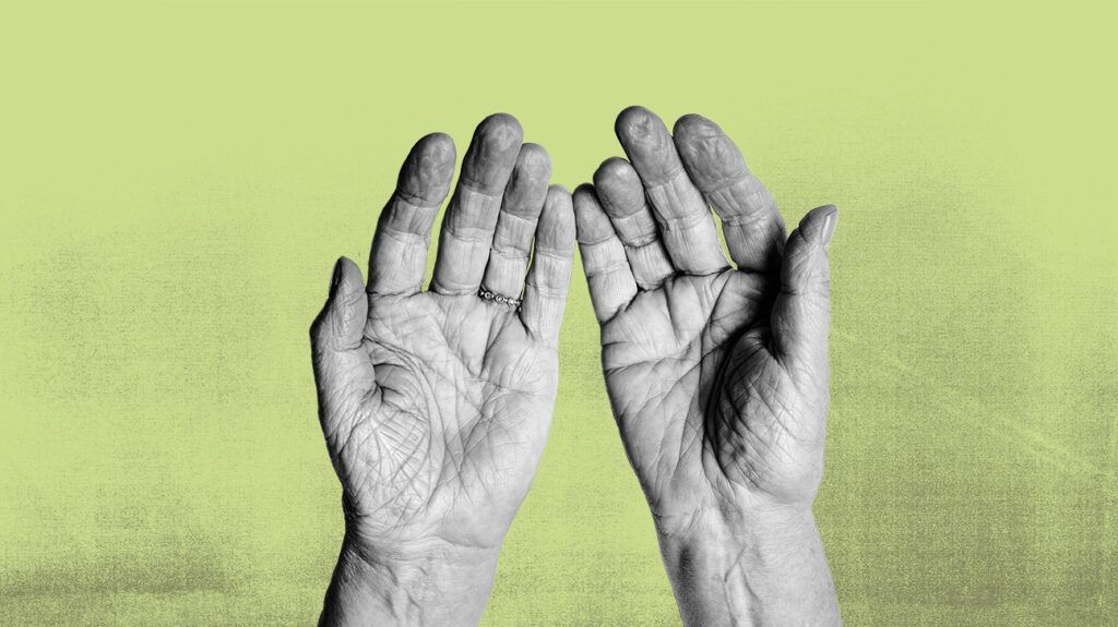 Two hands against a green background -1.