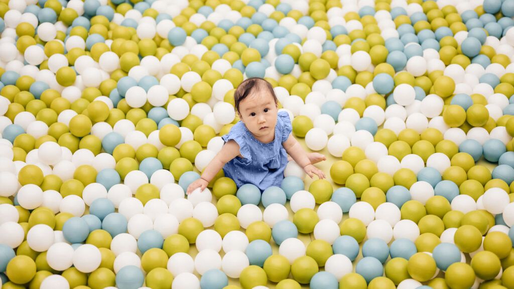 Infant in a ball pit