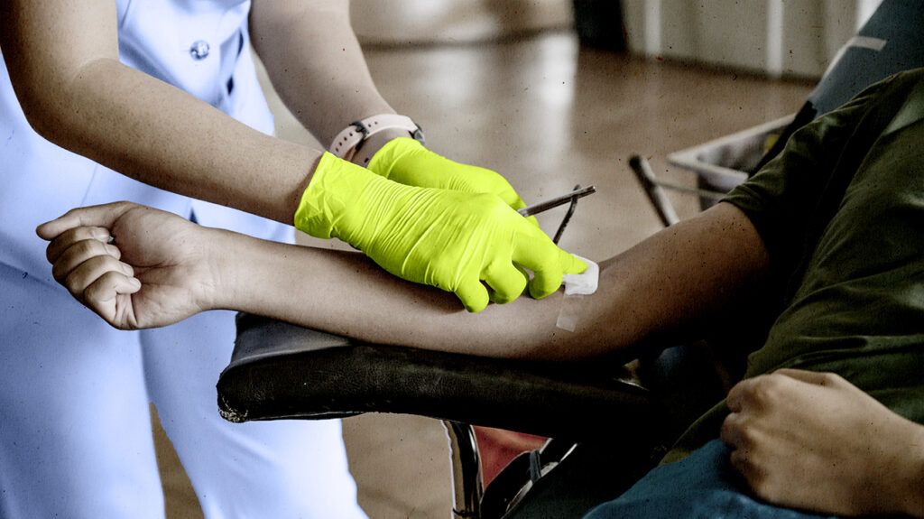 A person receiving a lipase test to check the pancreas.