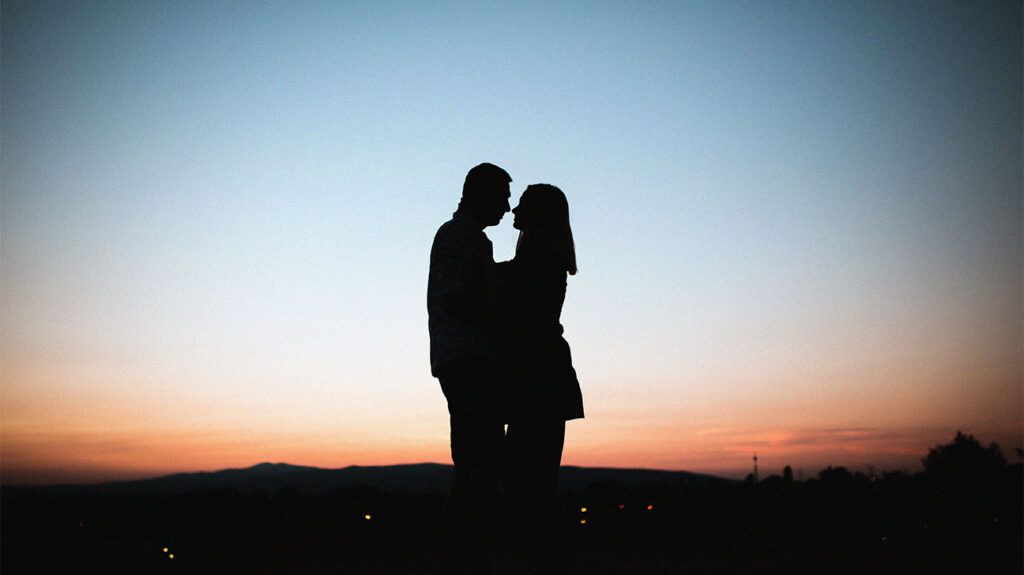 A silhouette of a kissing couple -2.