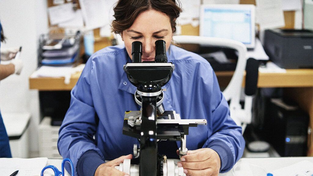 A person using a microscope in a laboratory-2.