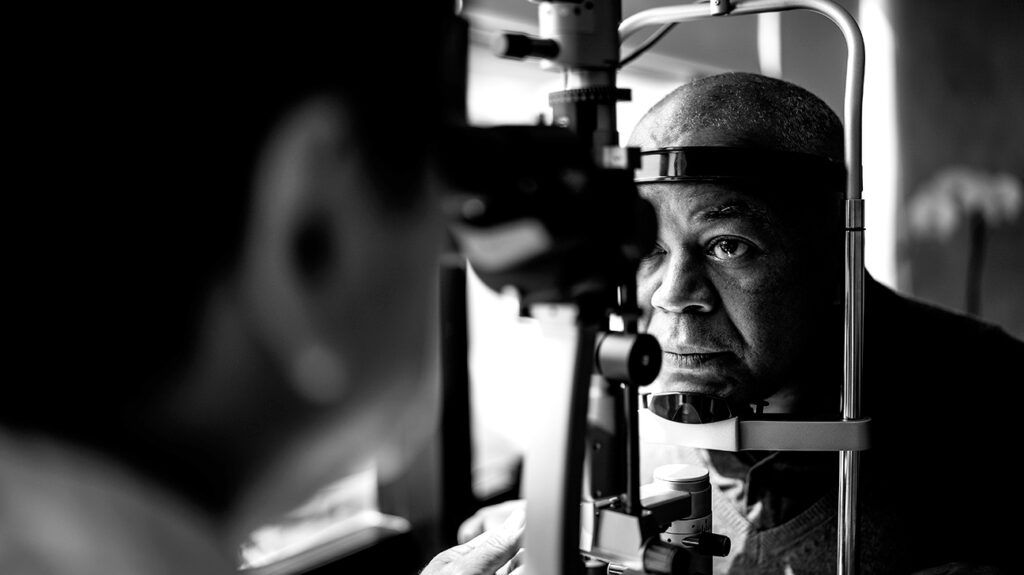 An optometrist performing an eye test-1.
