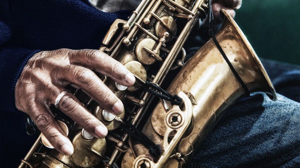 Close up of man playing the saxophone