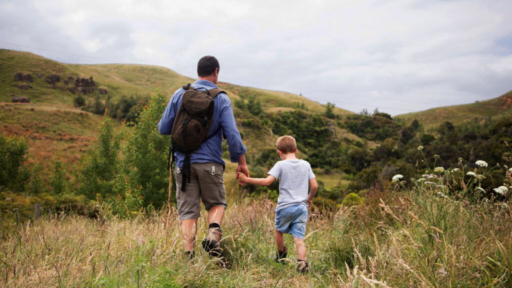 A father and son hiking -1.