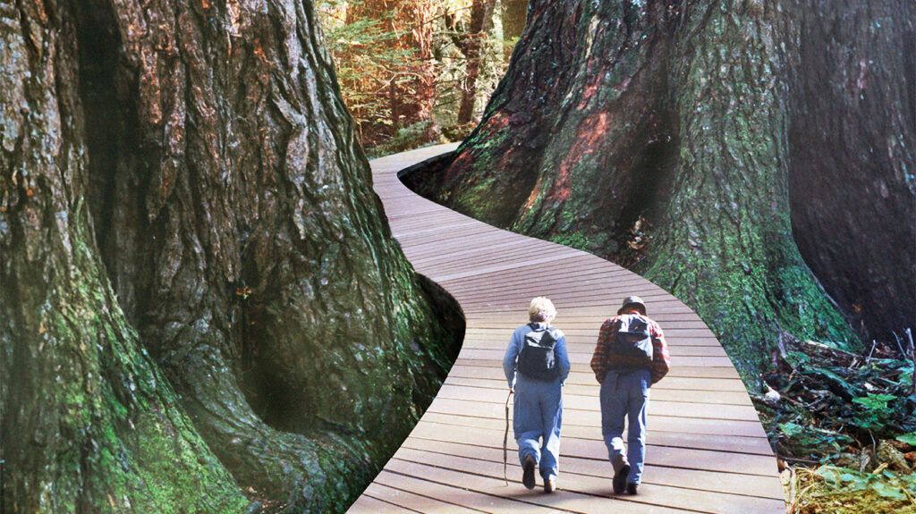 Older couple walks along a curved path outdoors