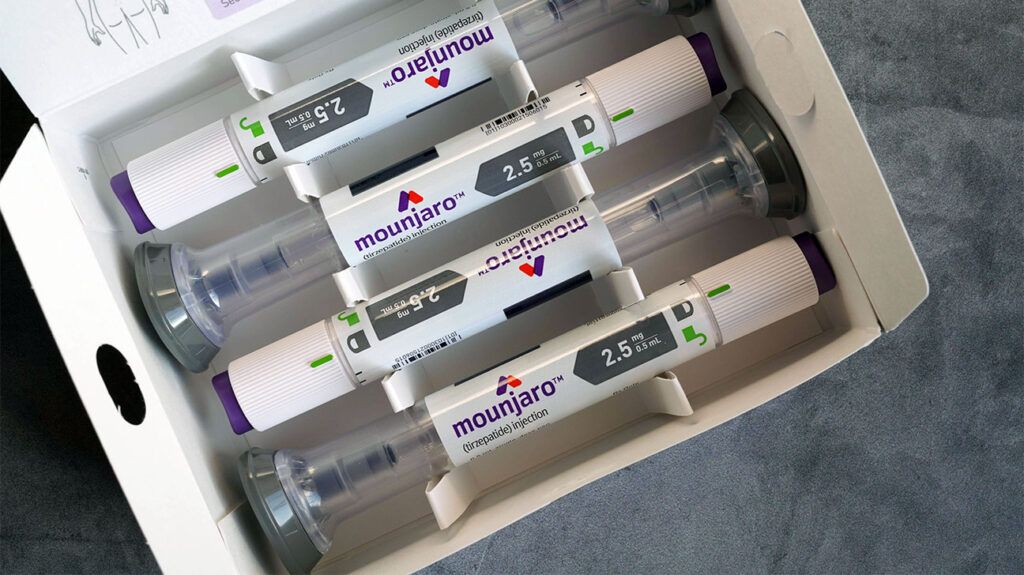 Four vials of Mounjaro injectable medication