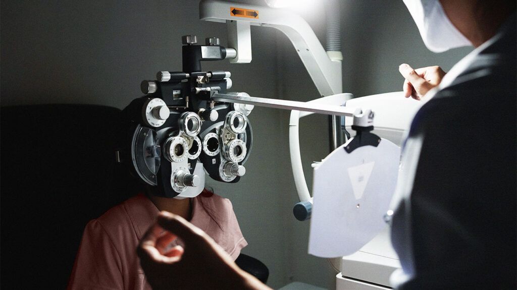 A person with glaucoma and high eye pressure getting an eye exam.-2