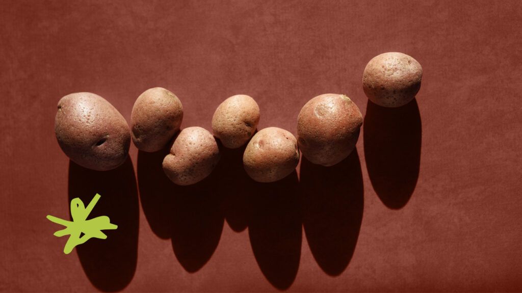 potatoes on brown background