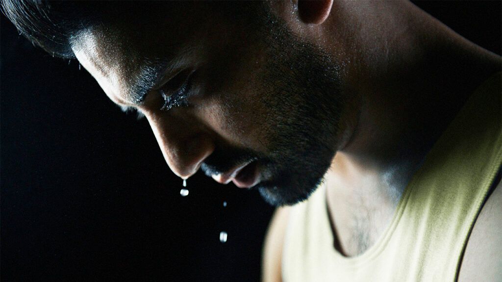 Closeup of a male sweating